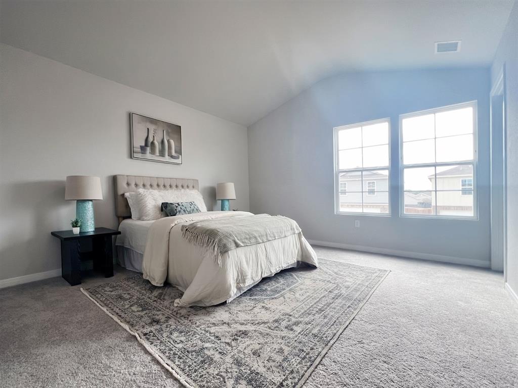 346 Azalea Trail Granbury, TX 76048 - Photo 6 of 11 a bedroom with a bed and a window