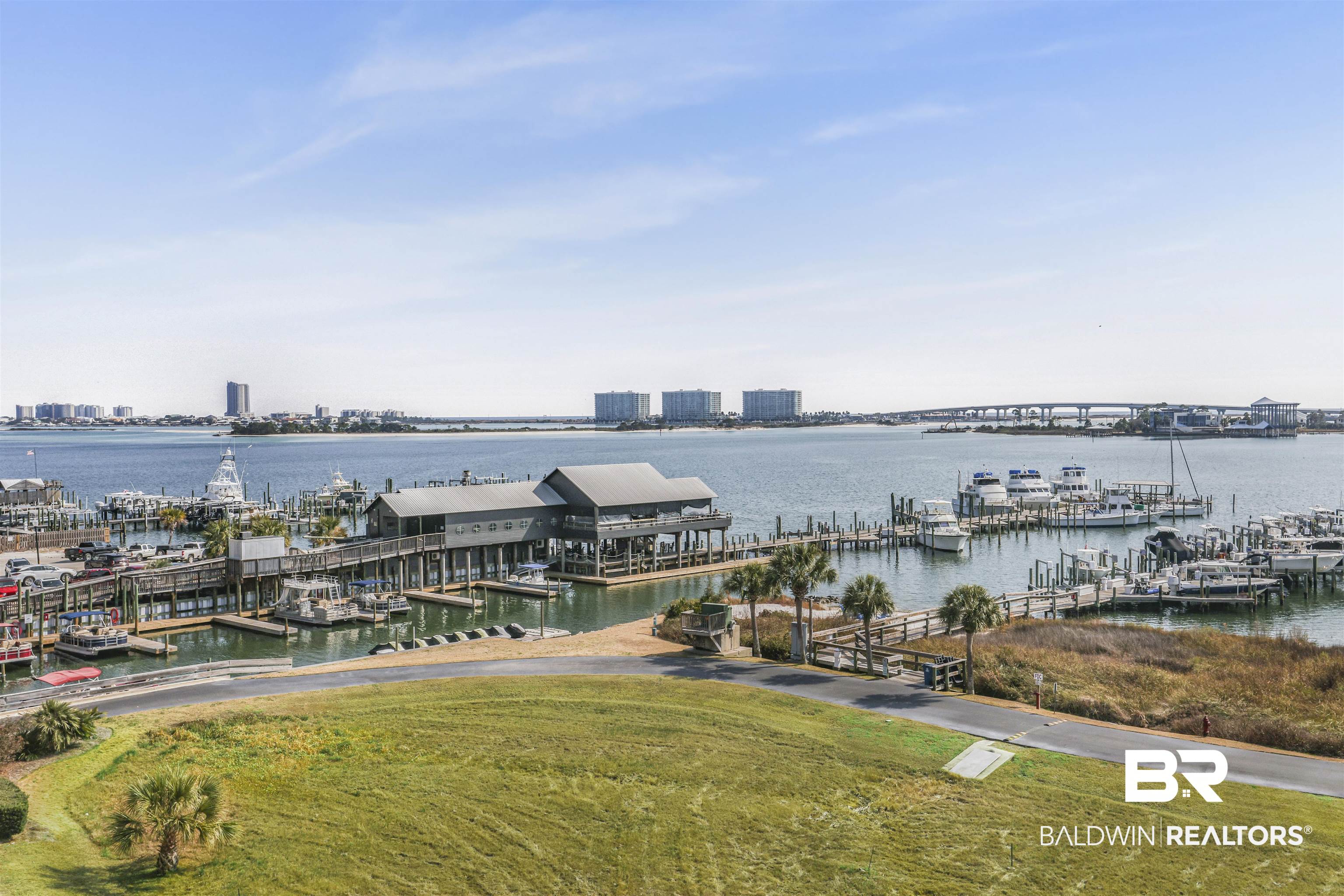27282 Canal Road, Unit 511 Orange Beach, AL 36561 - Photo 20 of 29 Water view with a marina and a boat dock