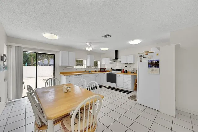 a bathroom with a sink a mirror and a shower
