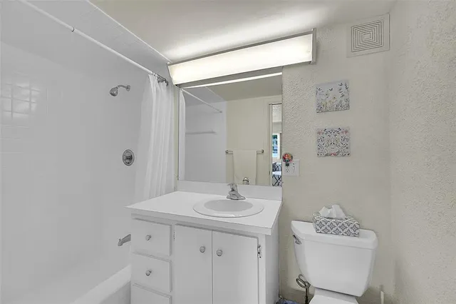 a view of a kitchen with furniture and a kitchen