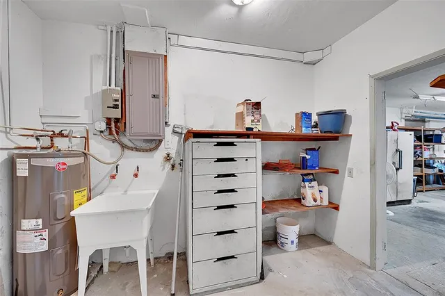 an aerial view of residential houses with city view