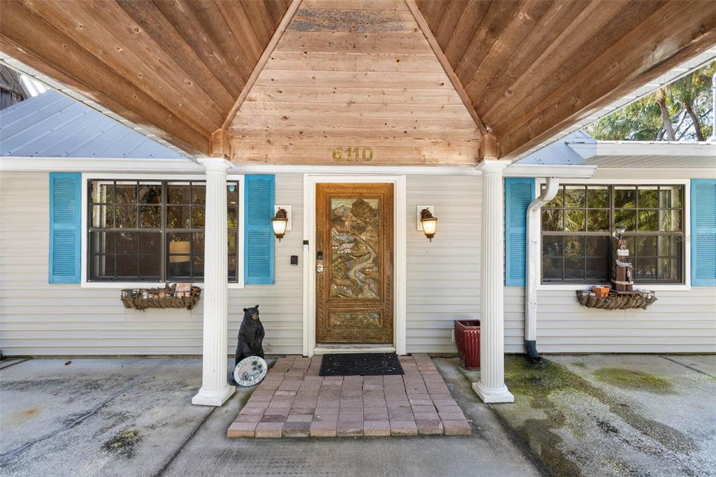 6110 Bear Trail Weeki Wachee, FL 34607 - Photo 11 of 48 a front view of a house