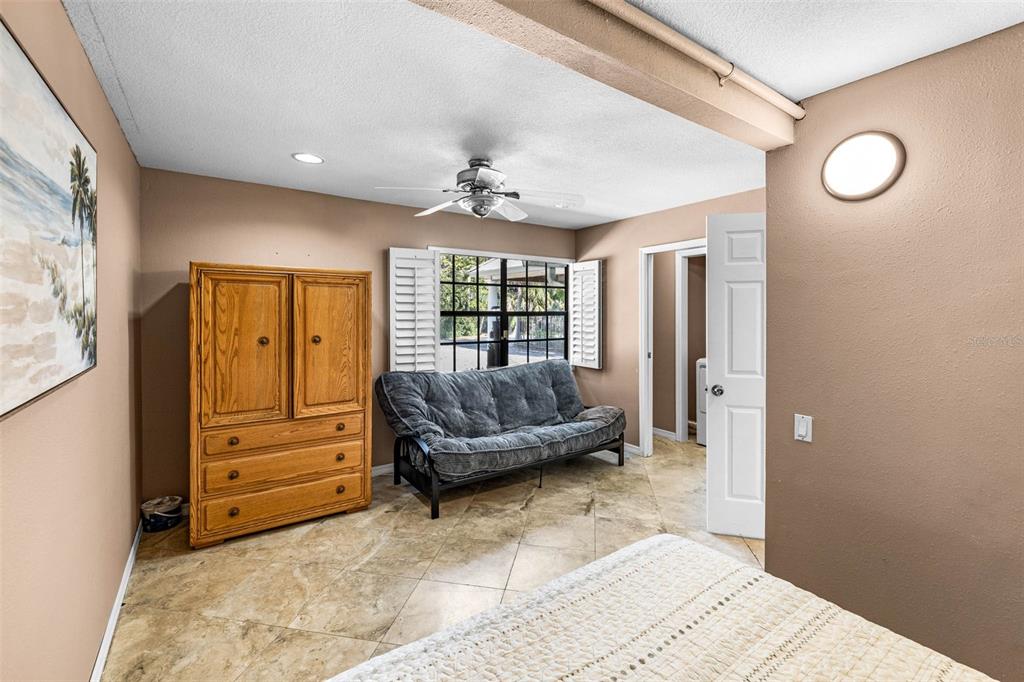 6110 Bear Trail Weeki Wachee, FL 34607 - Photo 22 of 48 a living room with furniture and a window