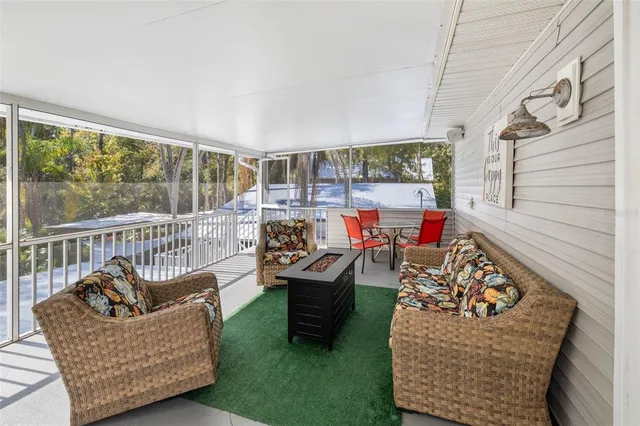 a outdoor space with patio furniture and a potted plant