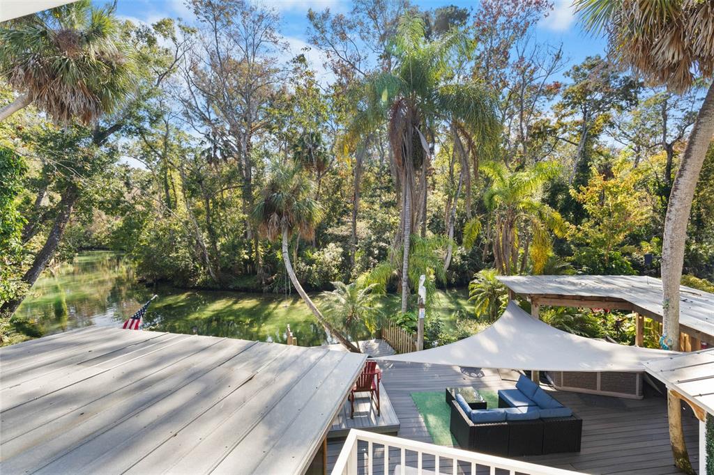 6110 Bear Trail Weeki Wachee, FL 34607 - Photo 34 of 48 a view of yard from deck with patio