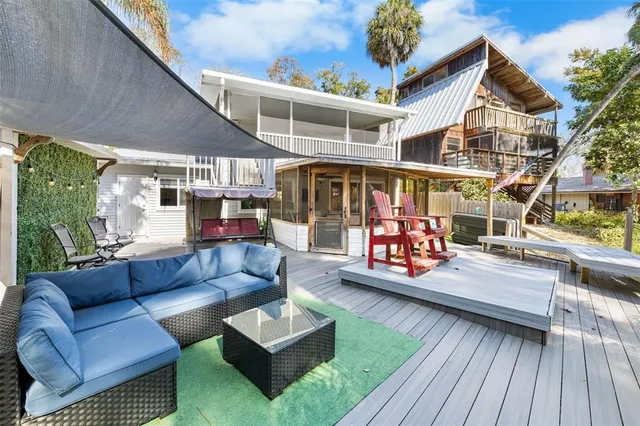 an aerial view of house with swimming pool