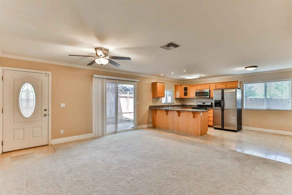 1133 Persimmon Avenue, Unit 7 El Cajon, CA 92021 - Photo 11 of 29 a view of kitchen and a refrigerator chandelier