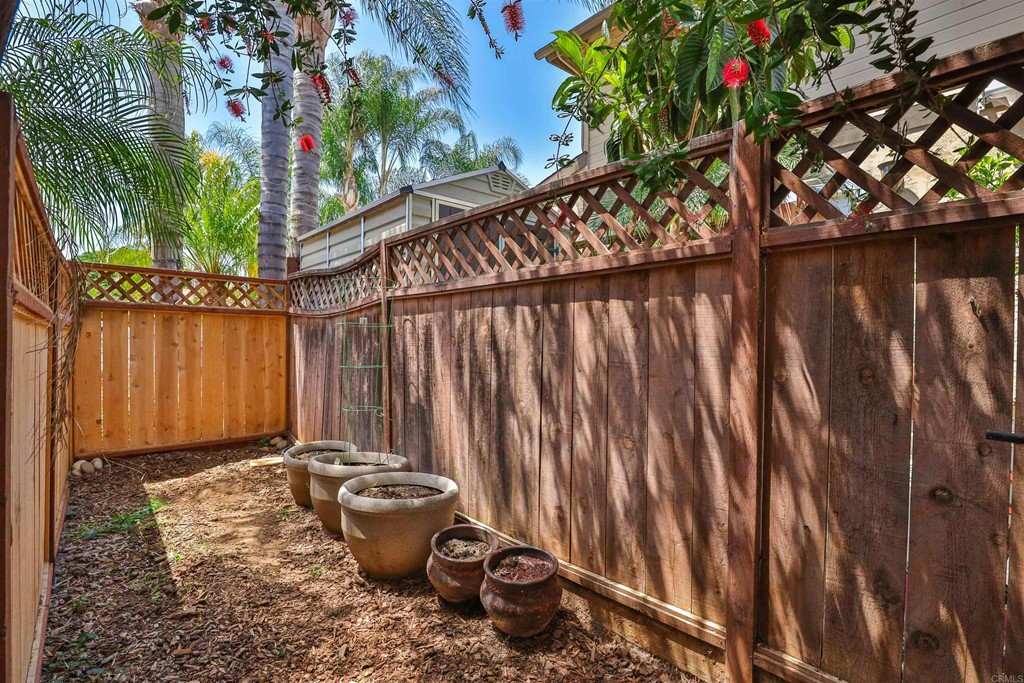 1133 Persimmon Avenue, Unit 7 El Cajon, CA 92021 - Photo 17 of 29 a bathroom with a toilet sink and garden view