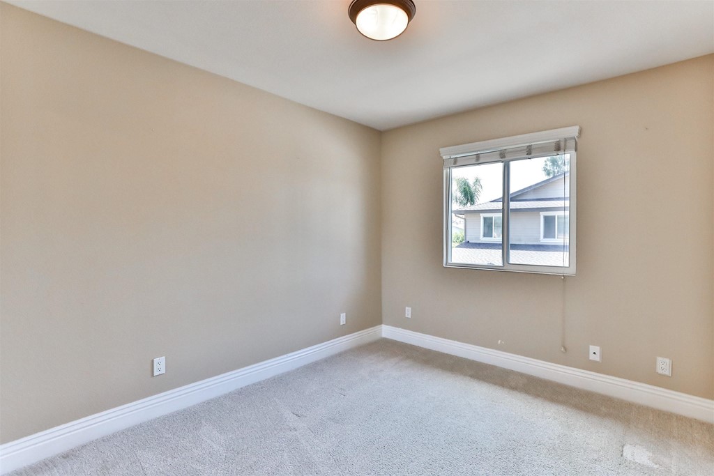 1133 Persimmon Avenue, Unit 7 El Cajon, CA 92021 - Photo 22 of 29 an empty room with windows