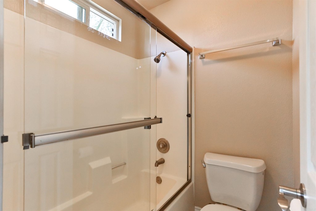 1133 Persimmon Avenue, Unit 7 El Cajon, CA 92021 - Photo 27 of 29 a bathroom with a shower and a toilet