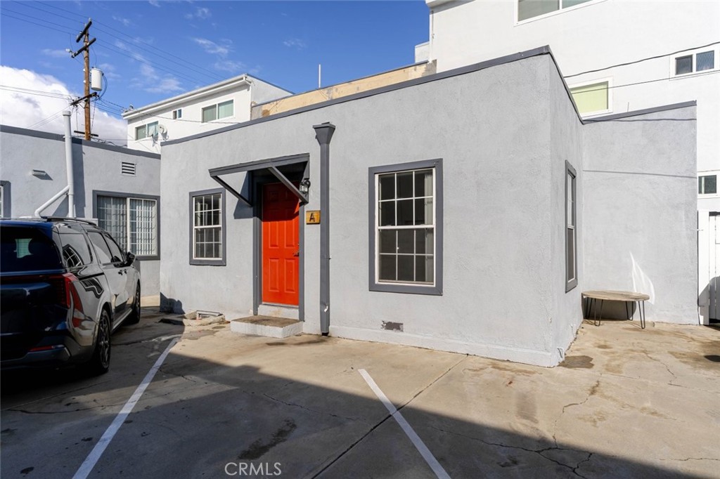 301 East Alameda Avenue, Unit A Burbank, CA 91502 - Photo 12 of 18 a front view of a house with a garage