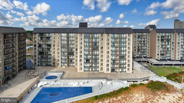 a picture of building with outdoor seating