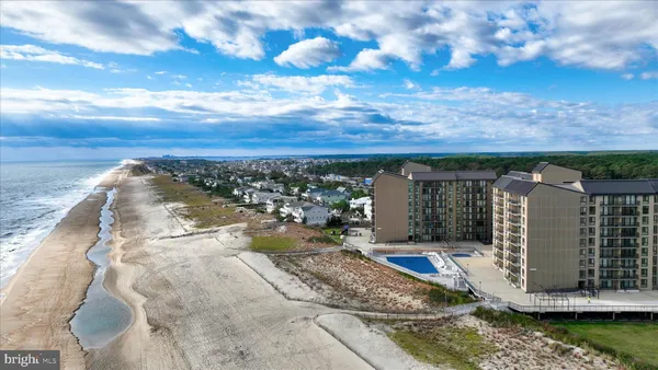 a view of a city with an ocean view