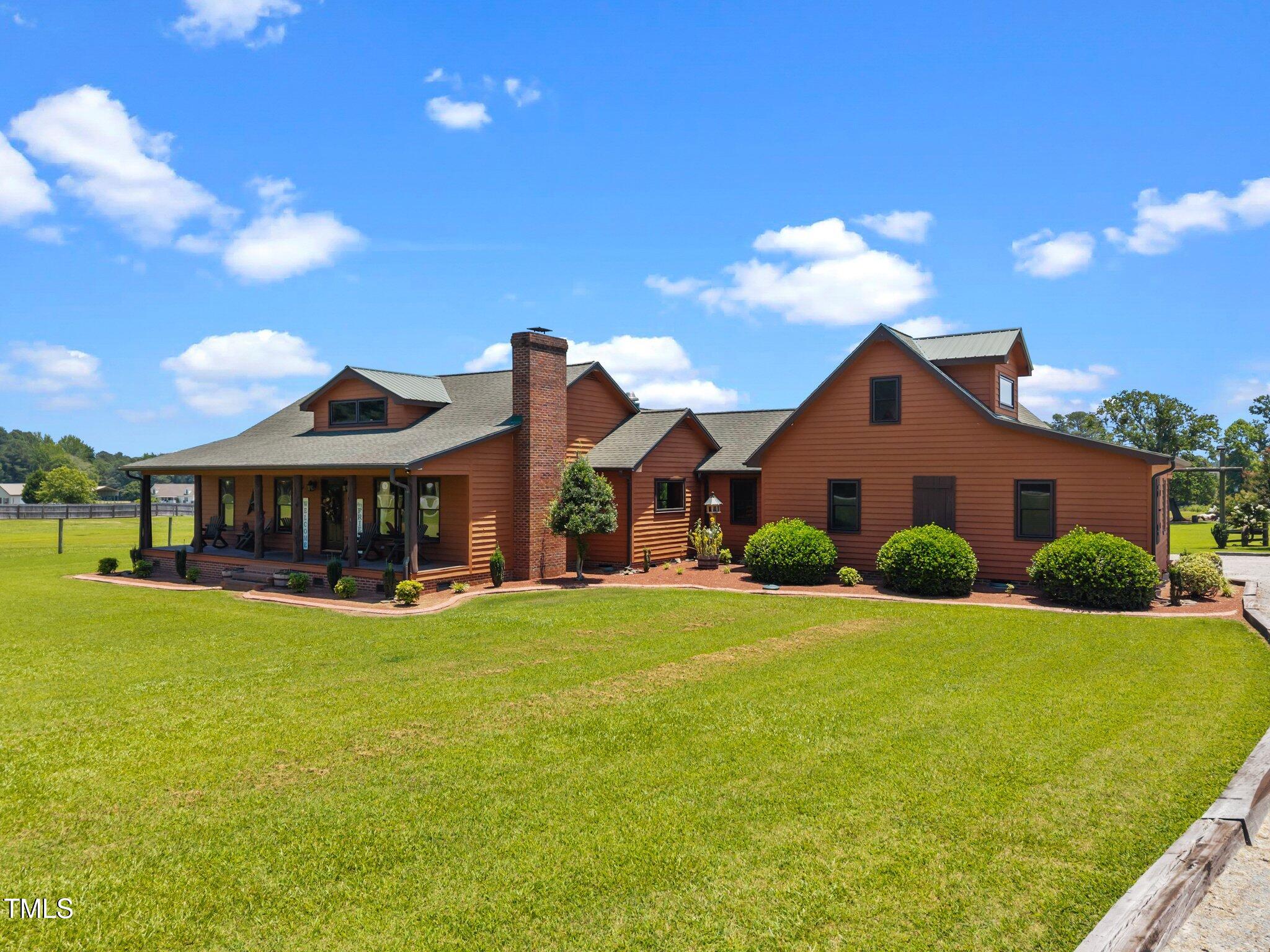 Undisclosed Address Coats, NC 27521 - Photo 4 of 87 3-web-or-mls-DJI_20250623130916_0502_D