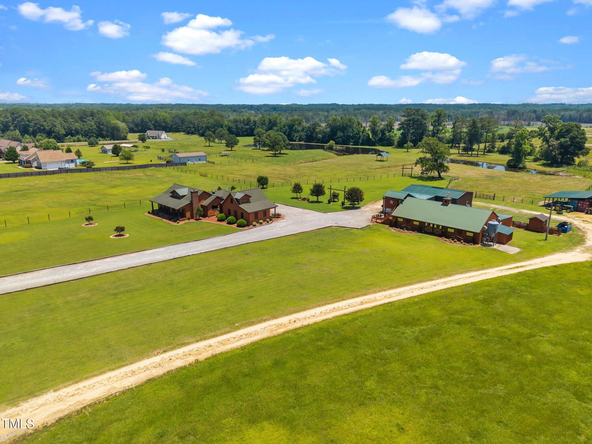 Undisclosed Address Coats, NC 27521 - Photo 74 of 87 11-web-or-mls-DJI_20250623131059_0505_D