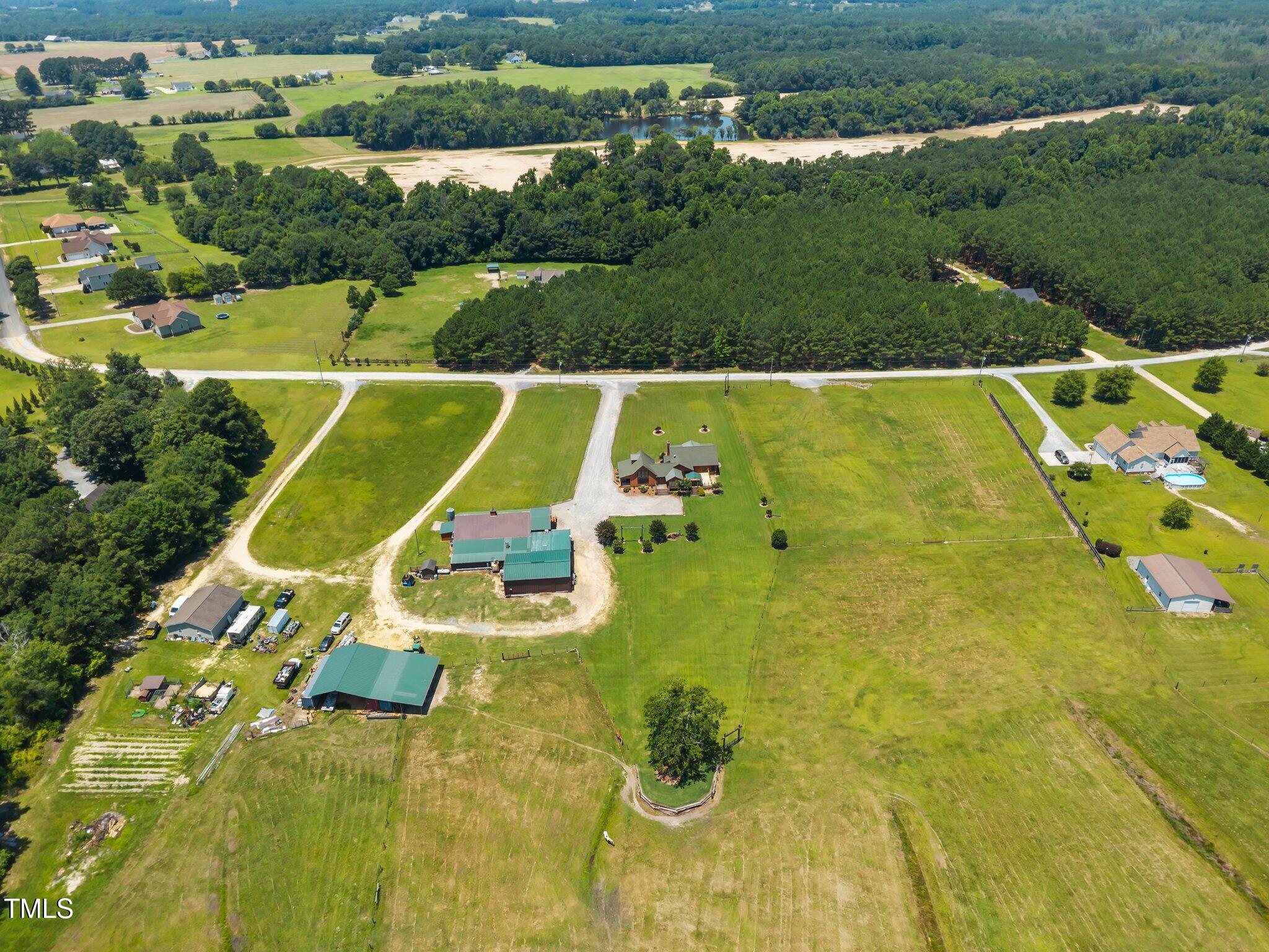 Undisclosed Address Coats, NC 27521 - Photo 76 of 87 8-web-or-mls-DJI_20250623130652_0500_D