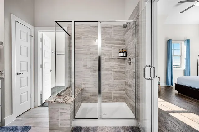 a bathroom with a granite countertop sink mirror and a