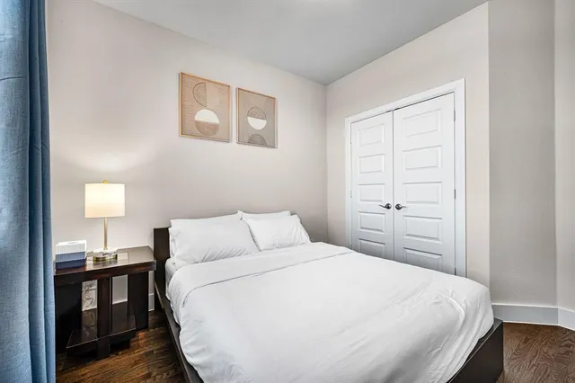 a bathroom with a toilet a sink and a mirror