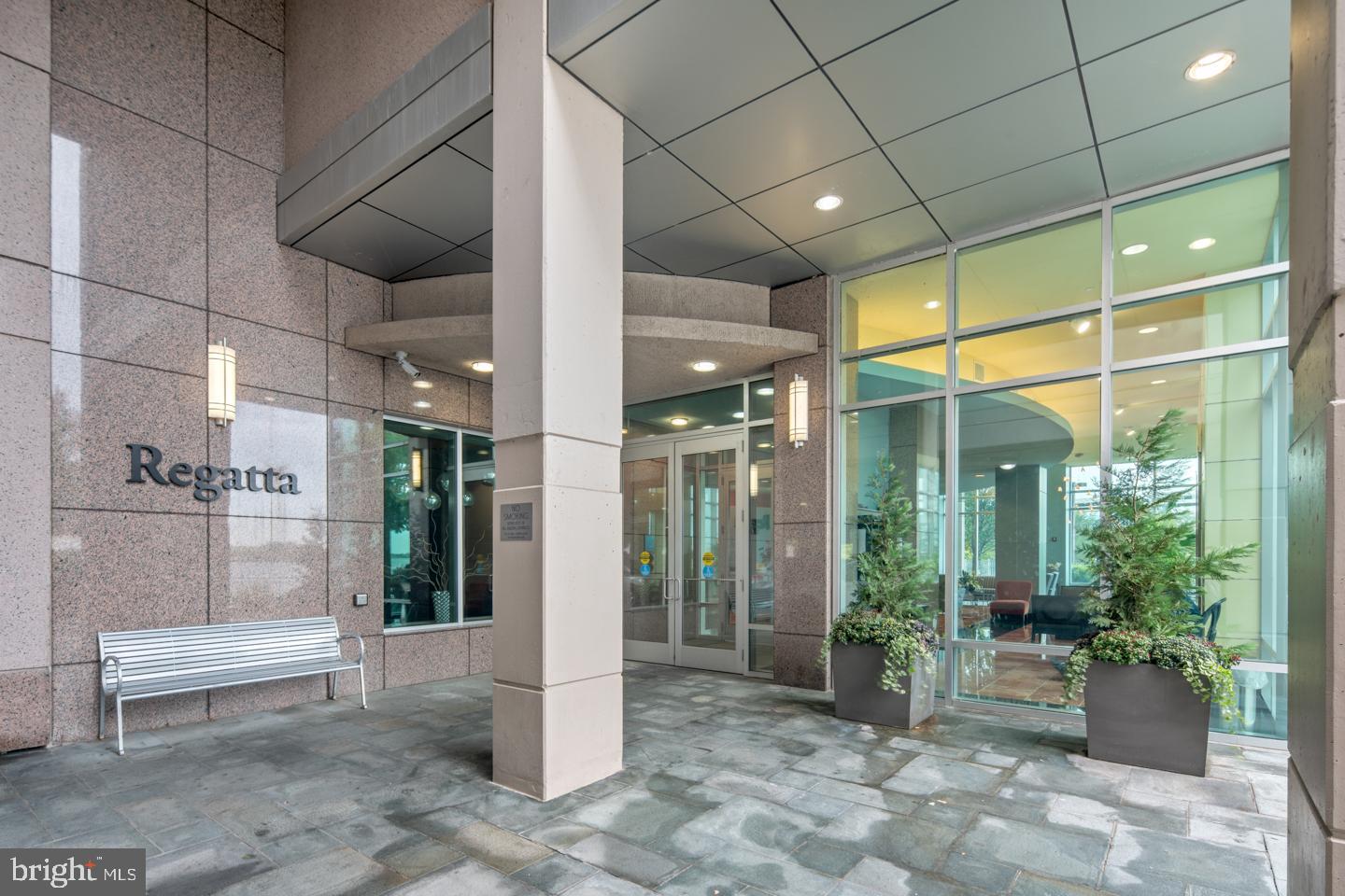 901 North Penn Street, Unit R1001 Philadelphia, PA 19123 - Photo 3 of 24 a building outdoor space with patio furniture and potted plants