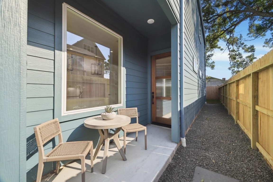 5337 Larkin Street Houston, TX 77007 - Photo 9 of 37 A sleek, modern front entry framed by clean lines, natural wood, and privacy offering a warm welcome home.