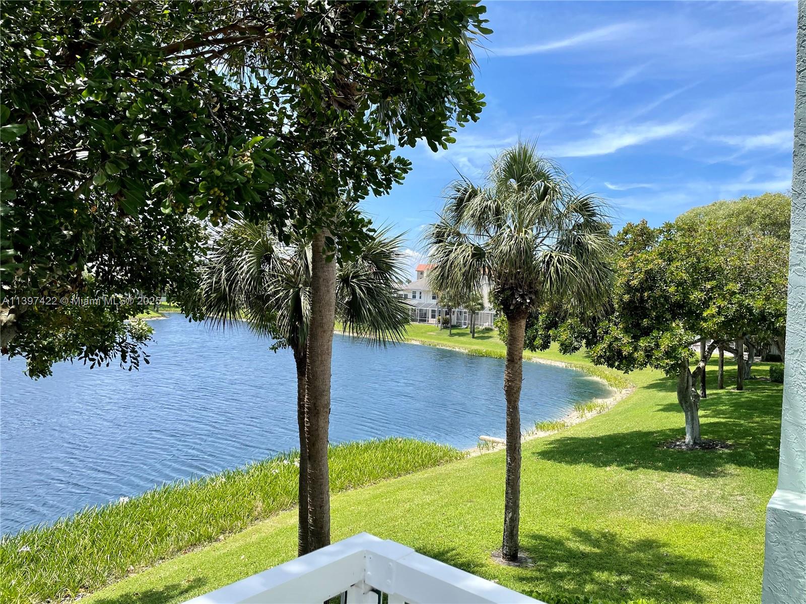 905 Mainsail Circle, Unit 905 Jupiter, FL 33477 - Photo 11 of 27 a view of yard with green space