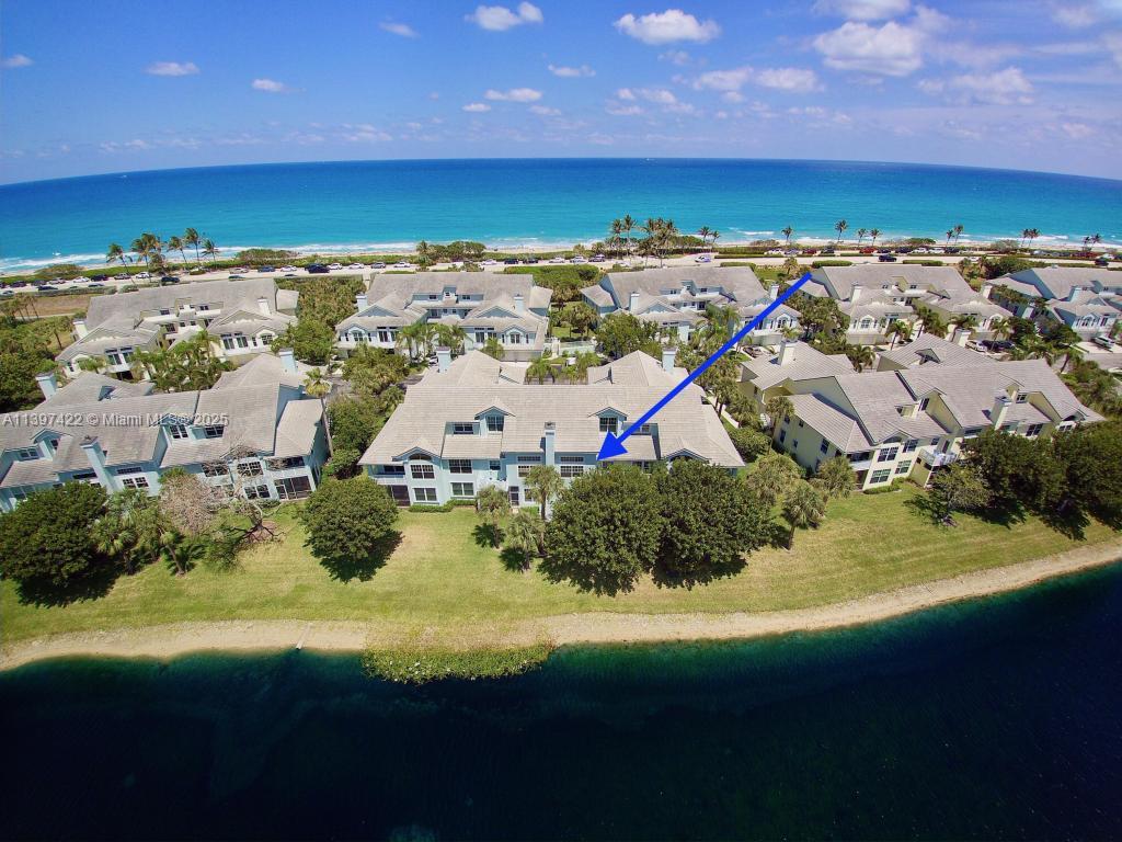 905 Mainsail Circle, Unit 905 Jupiter, FL 33477 - Photo 21 of 27 a view of a sky from a balcony