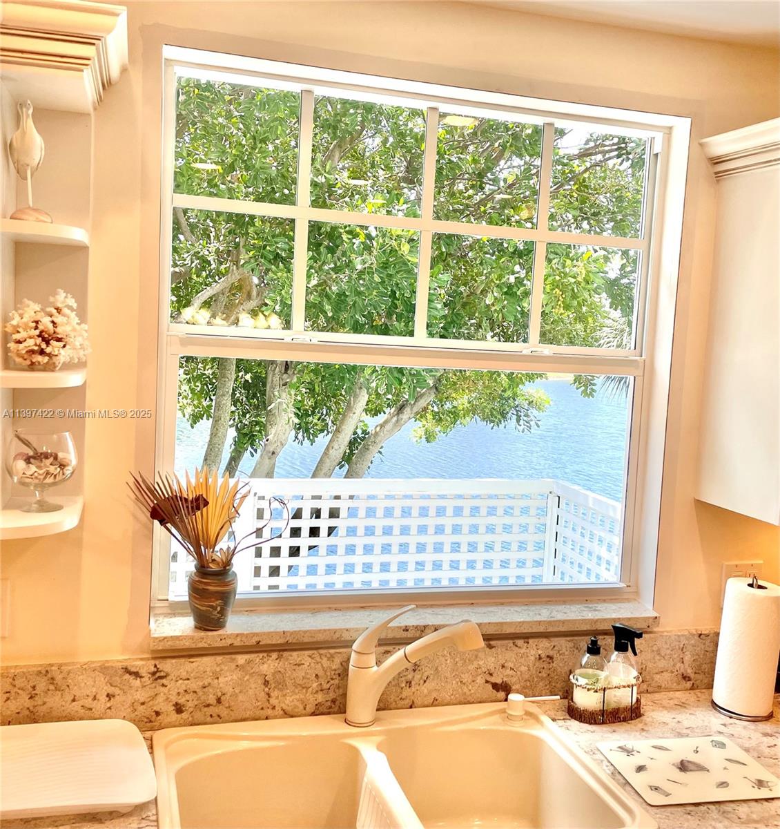 905 Mainsail Circle, Unit 905 Jupiter, FL 33477 - Photo 7 of 27 a view of a sink and chair