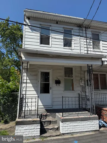 a view of a house with a balcony