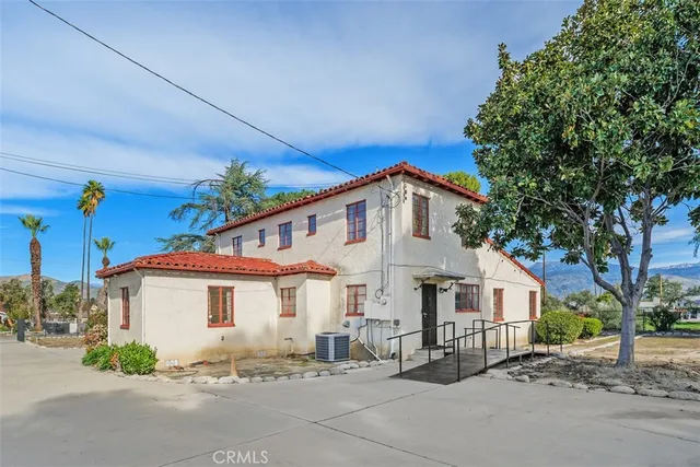 a view of a house with a street