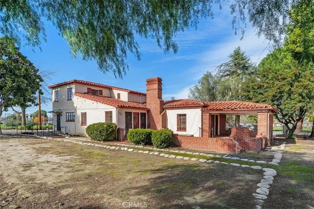 a backyard of a house with lots of green space
