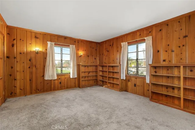 a view of a room with storage and utility room