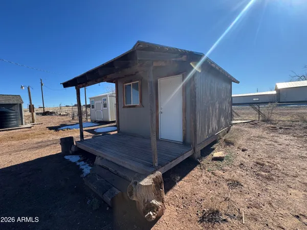 a outdoor space with lots of furniture and shower