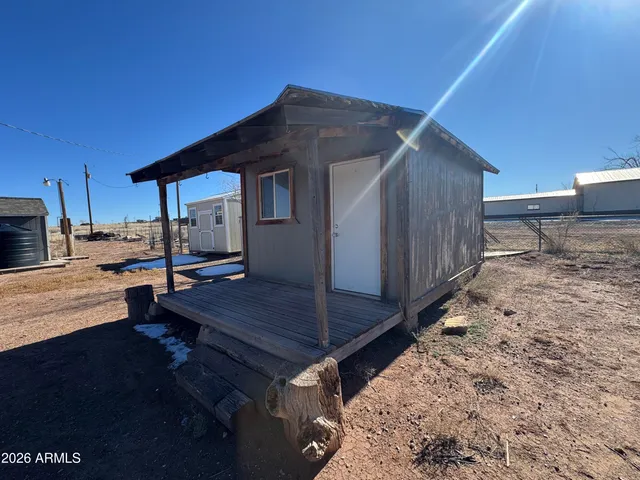 a outdoor space with lots of furniture and shower