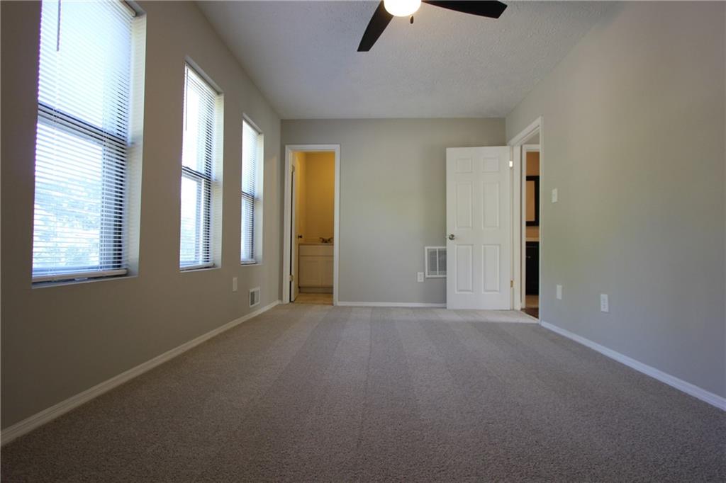 3085 Creel Road College Park, GA 30349 - Photo 14 of 38 an empty room with windows and closet