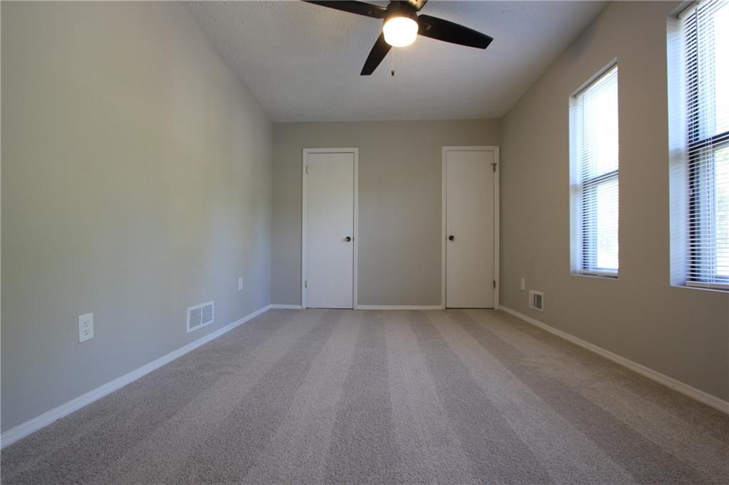 3085 Creel Road College Park, GA 30349 - Photo 16 of 38 wooden floor in an empty room with a window
