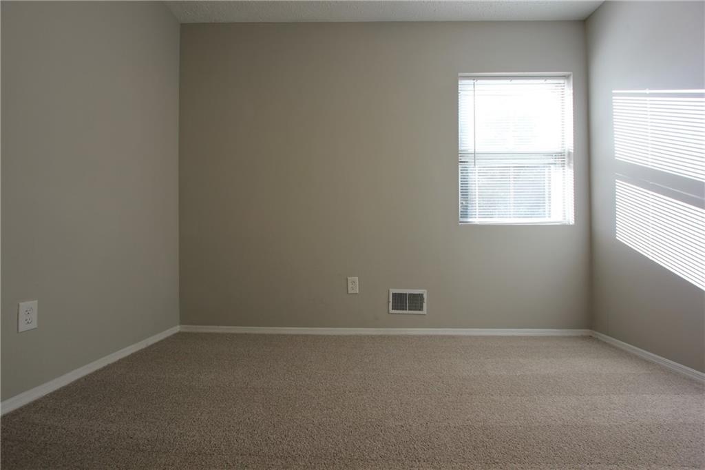 3085 Creel Road College Park, GA 30349 - Photo 17 of 38 an empty room with a window