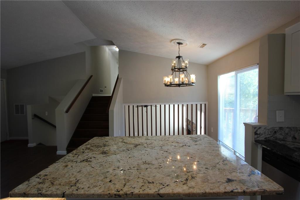 3085 Creel Road College Park, GA 30349 - Photo 10 of 38 a view of a livingroom with furniture and chandelier