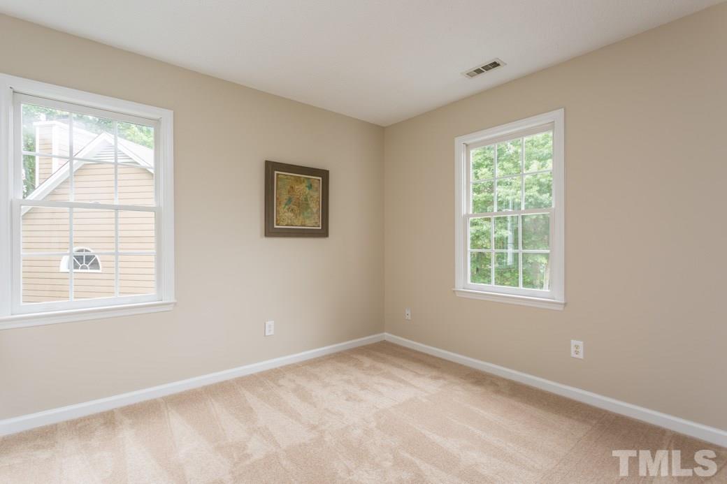 12304 Hartwick Court Raleigh, NC 27613 - Photo 11 of 14 an empty room with a window