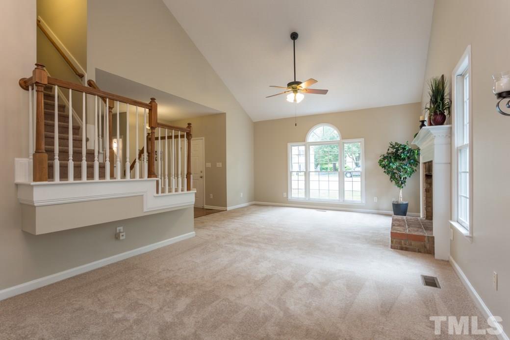 12304 Hartwick Court Raleigh, NC 27613 - Photo 6 of 14 a view of an empty room with a window