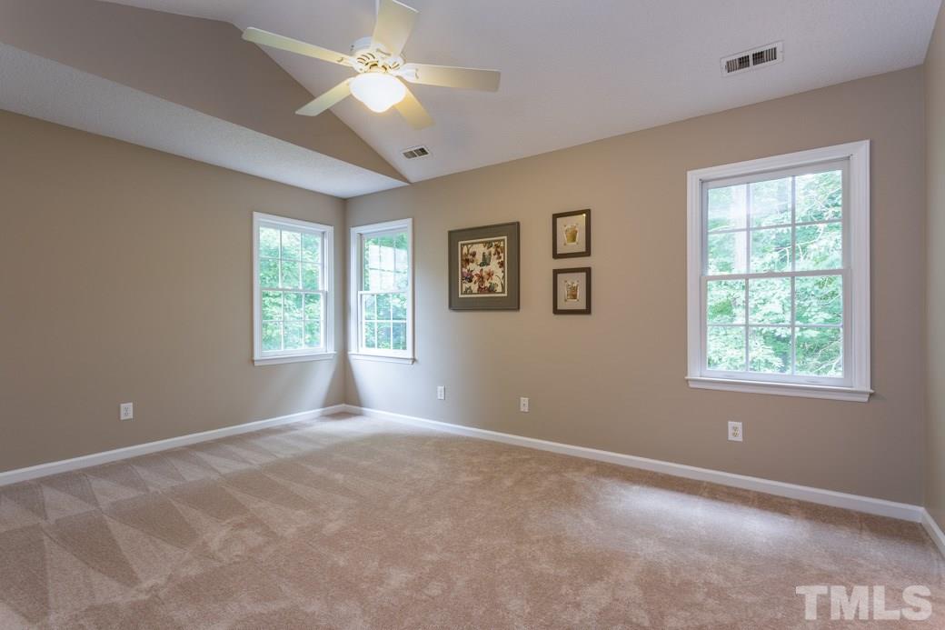 12304 Hartwick Court Raleigh, NC 27613 - Photo 8 of 14 a view of an empty room with a window