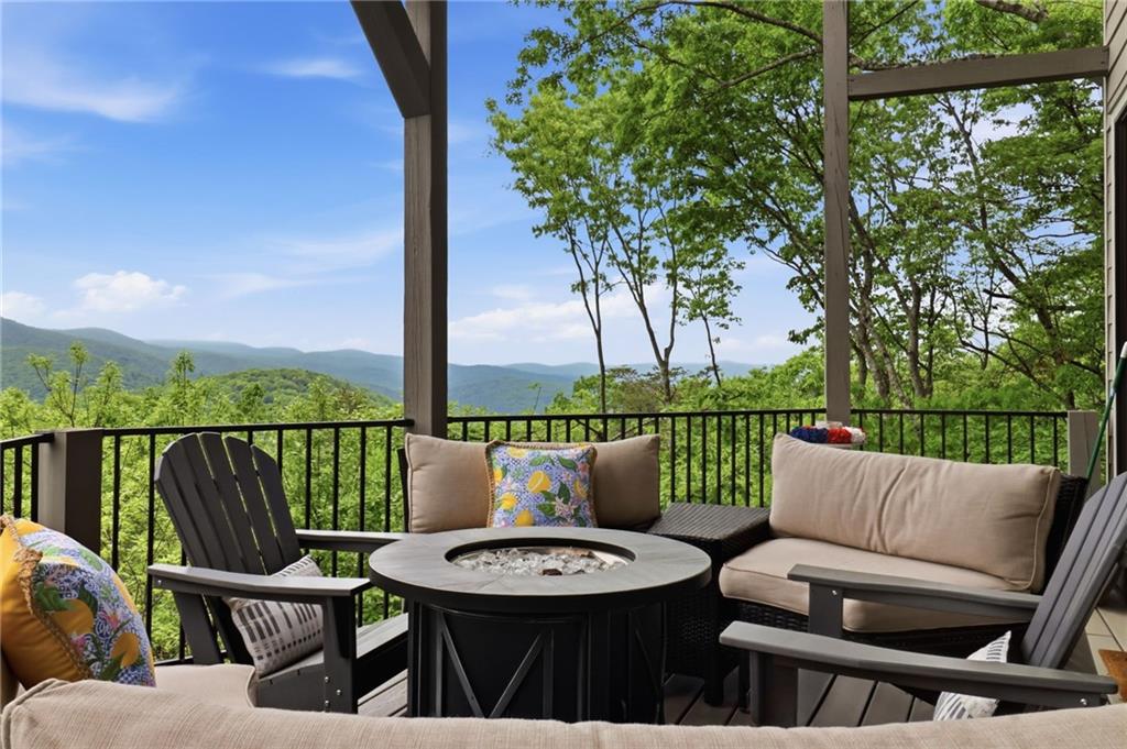59 Falcon Heights Jasper, GA 30143 - Photo 13 of 47 a balcony with furniture and a potted plant