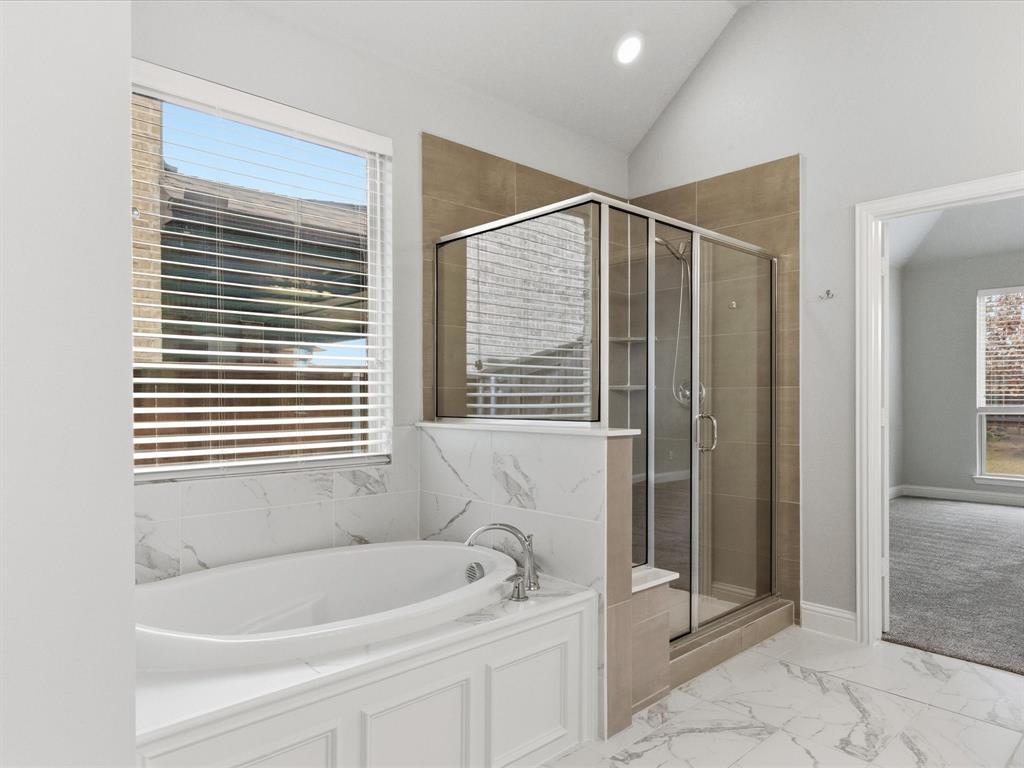 2217 Commons Way Prosper, TX 75078 - Photo 31 of 37 Full bath featuring a garden tub, a stall shower, light marble finish flooring, vaulted ceiling, and recessed lighting