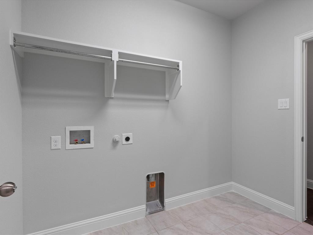 2217 Commons Way Prosper, TX 75078 - Photo 34 of 37 Laundry room with hookup for a gas dryer, washer hookup, and electric dryer hookup