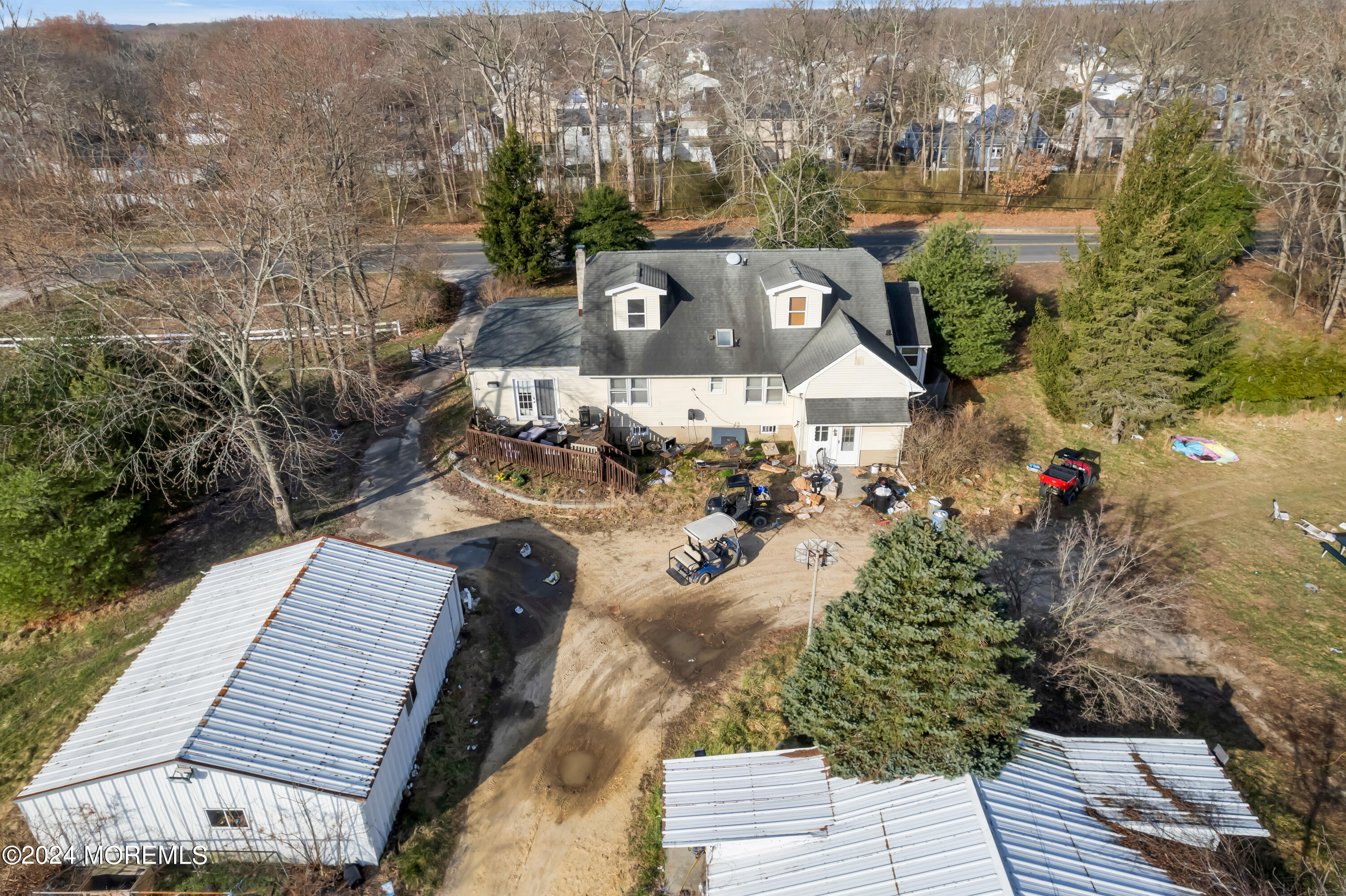 251 Oak Glen Road Howell, NJ 07731 - Photo 14 of 24 an aerial view of a house with a yard