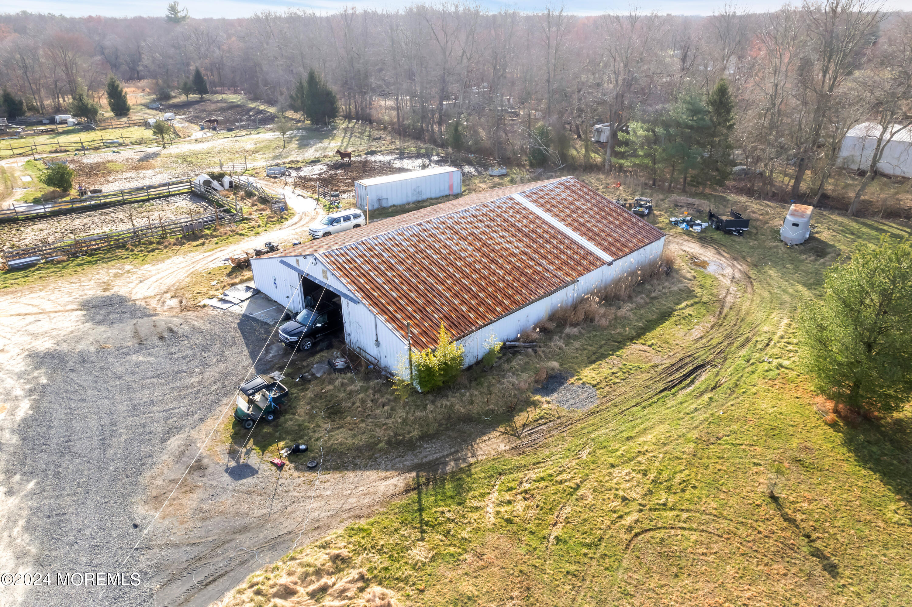 251 Oak Glen Road Howell, NJ 07731 - Photo 16 of 24 a view of a backyard with sitting area