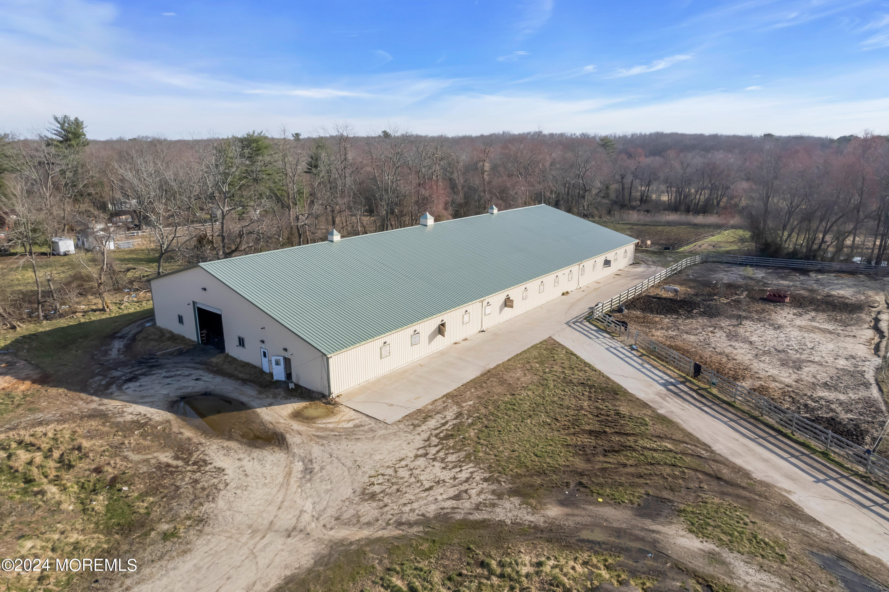 251 Oak Glen Road Howell, NJ 07731 - Photo 18 of 24 a view of a terrace with a forest
