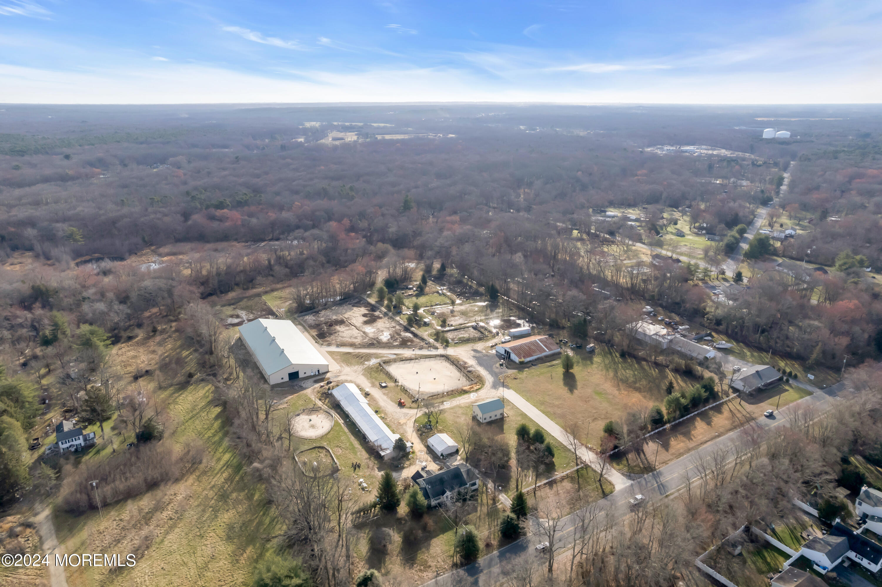 251 Oak Glen Road Howell, NJ 07731 - Photo 4 of 24 an aerial view of a house with a yard