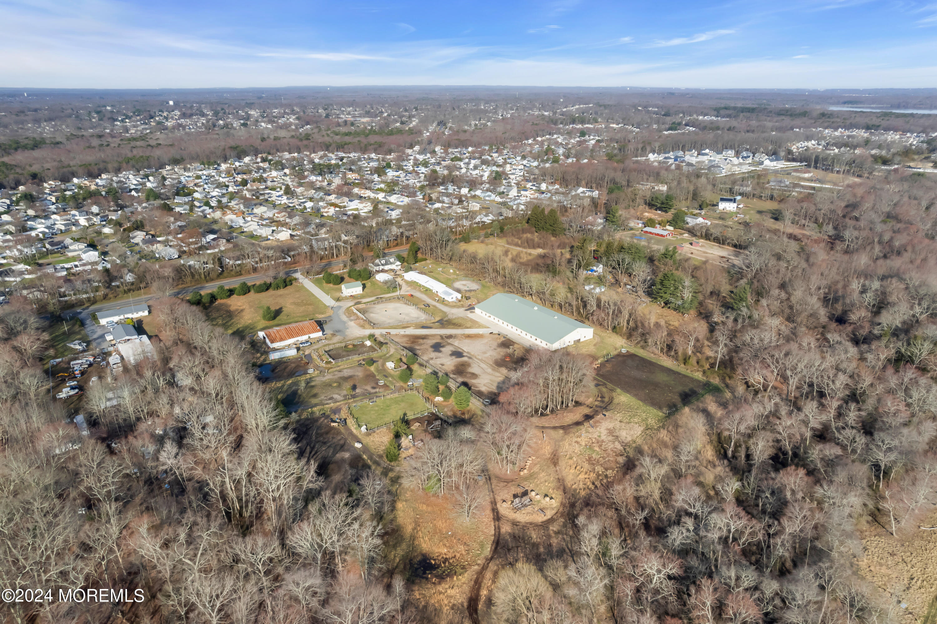 251 Oak Glen Road Howell, NJ 07731 - Photo 8 of 24 an aerial view of residential building with parking space