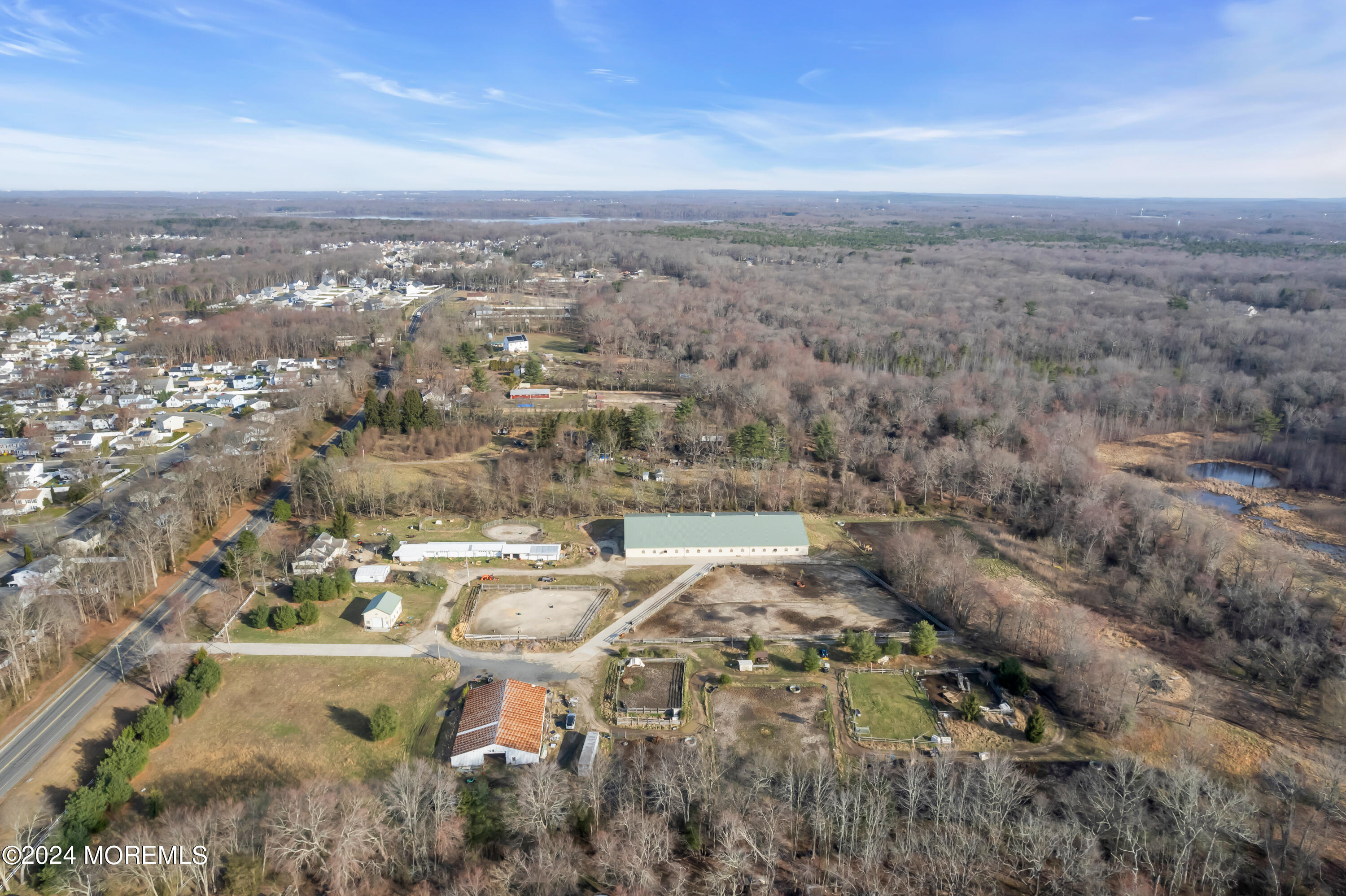 251 Oak Glen Road Howell, NJ 07731 - Photo 9 of 24 an aerial view of residential building and city view
