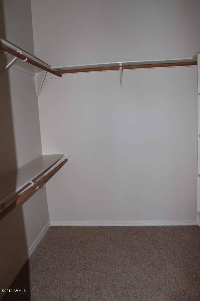 11517 East Ranch Gate Road Scottsdale, AZ 85255 - Photo 20 of 35 a view of a room with racks on the wall